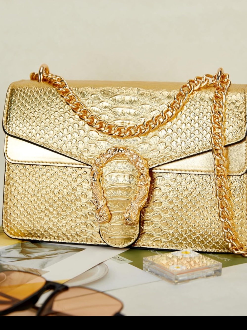 Crossbody gold with part snake design faux leather
